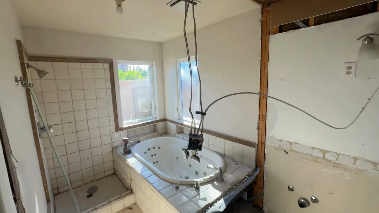 A bathroom stripped to the studs during a plumbing remodel for Bathroom Plumbing & Remodel in Alpharetta, GA