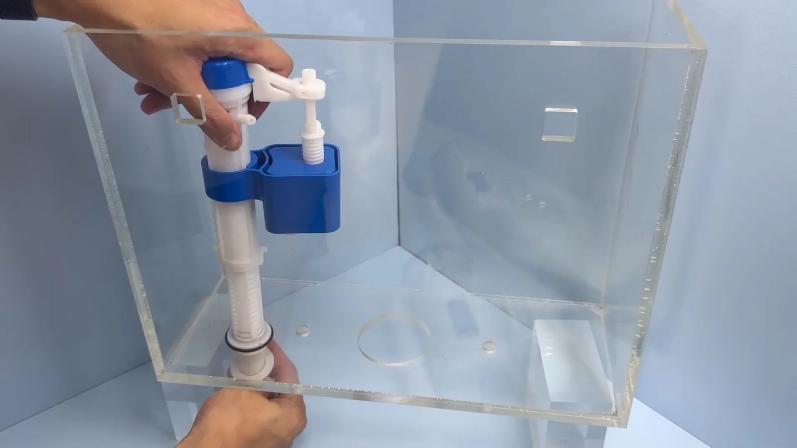 A toilet tank opened to replace its internal repair kit for Toilet Repair & Installation in Alpharetta, GA