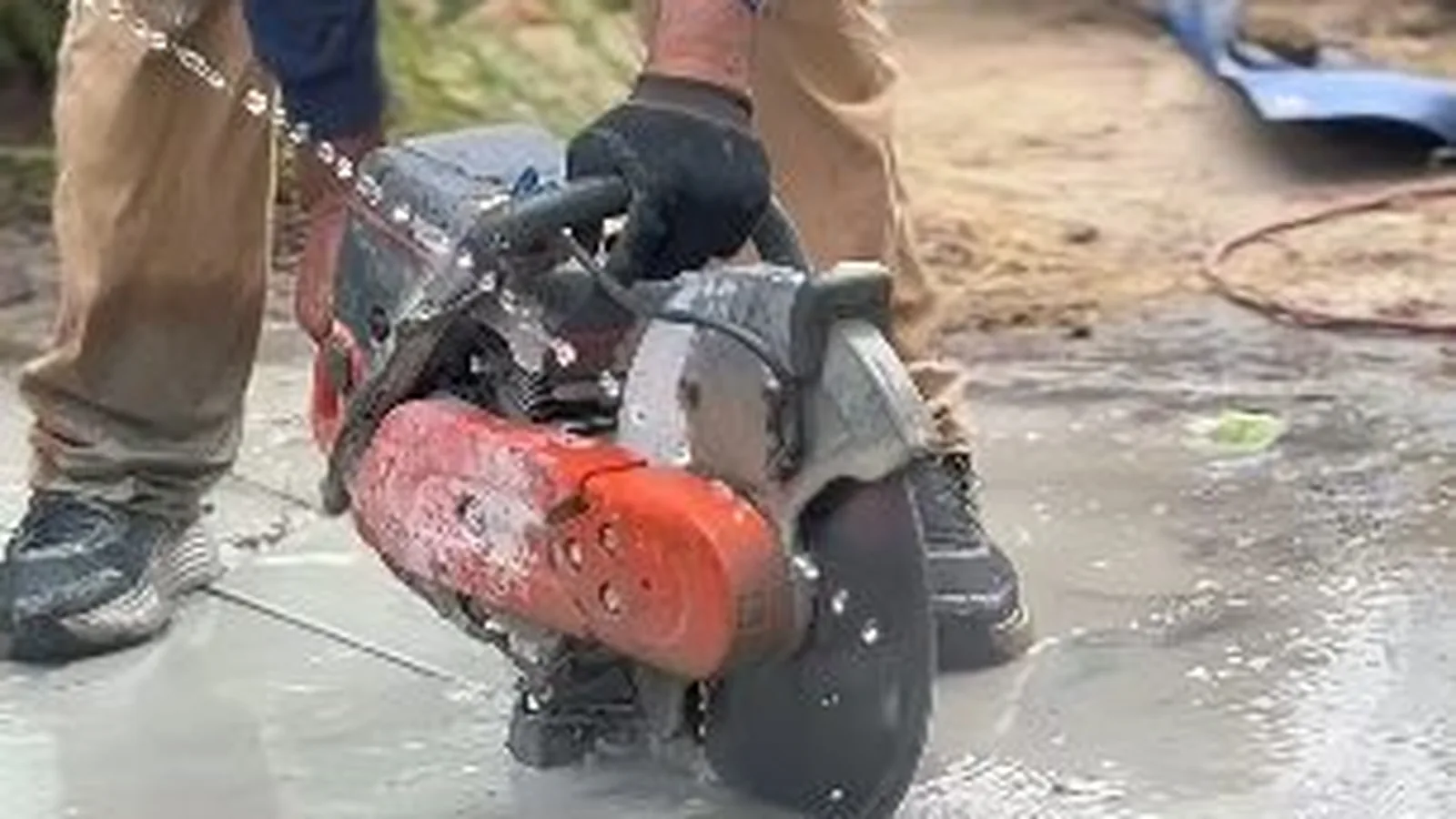 A high-pressure jetting hose fed into a sewer cleanout for Hydro Jetting in Alpharetta, GA
