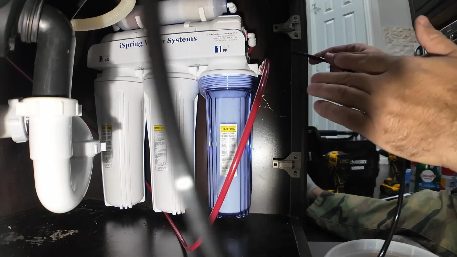 Tubing connections at a reverse osmosis system's manifold during a service visit in Marietta, GA