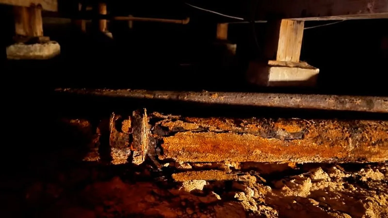 Rust and scale built up inside an old cast iron drain on a plumbing call in Old Alpharetta